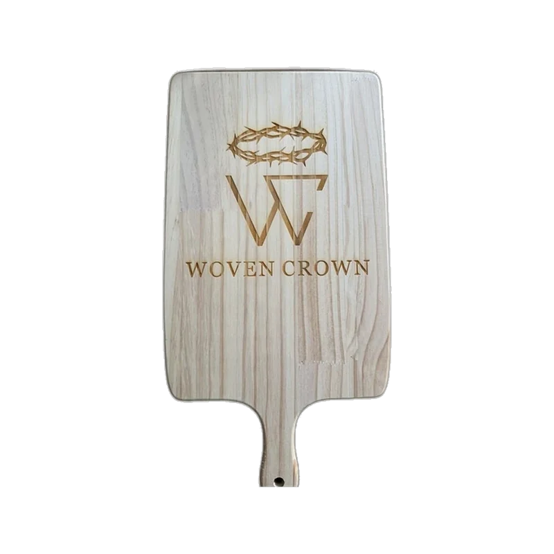 Hardwood cutting board engraved with the Woven Crown crest